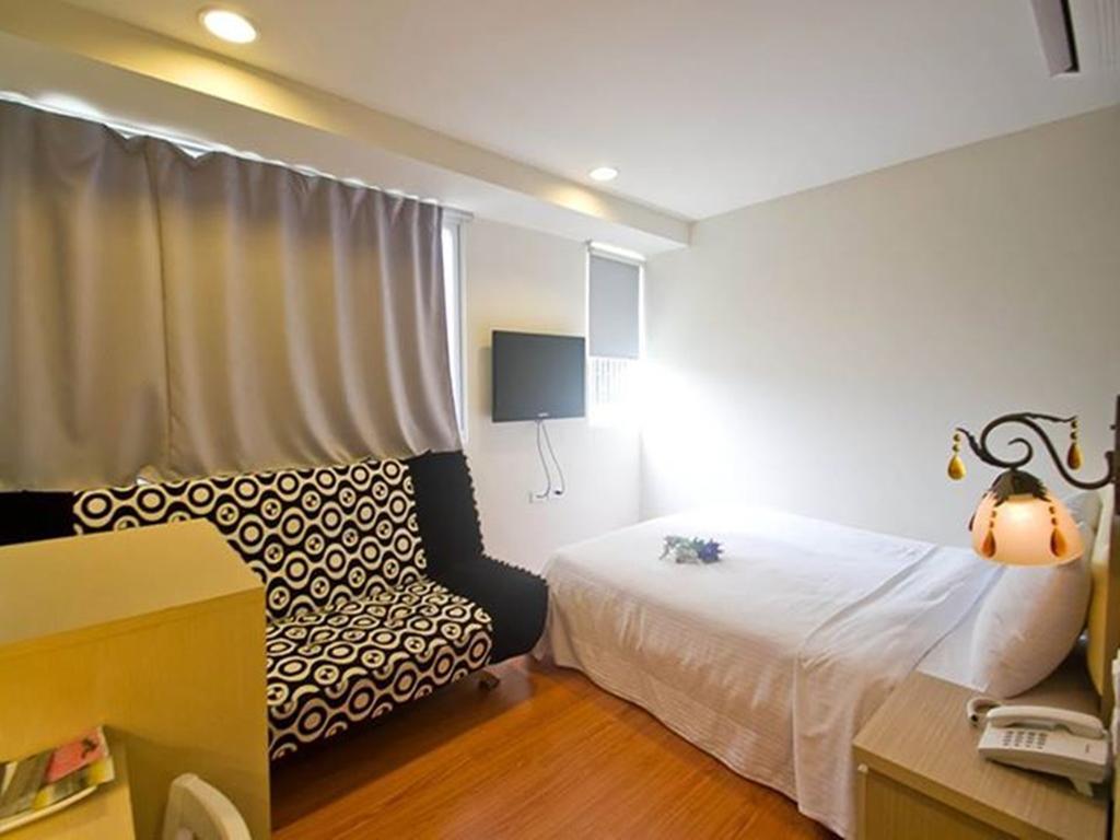 Green Park Commercial Hotel Tainan Habitación foto